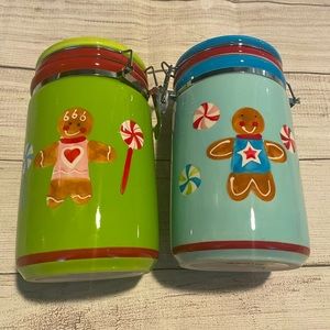 A pair of Home for the Holidays Christmas kitchen canisters.